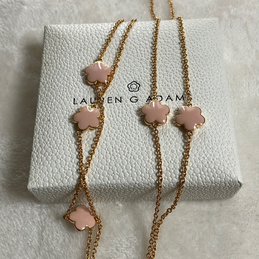 Designer necklace by Lauren G. Adams. Long gold tone chain w/pink enamel roses.